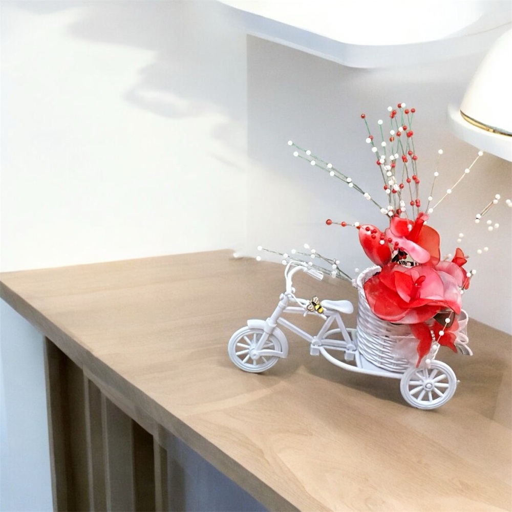 White Bicycle Planter with Red Flowers